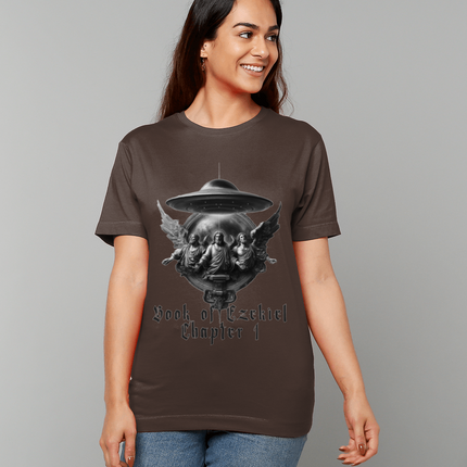 Woman wearing a brown t-shirt with a graphic design on a gray background
