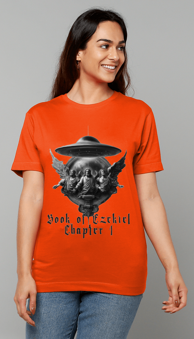 Woman wearing an orange t-shirt with a graphic design and text on a gray background
