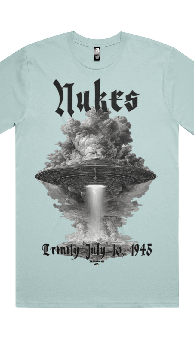 Light blue t-shirt with a graphic design of a mushroom cloud and 'Nukes' text on a white background