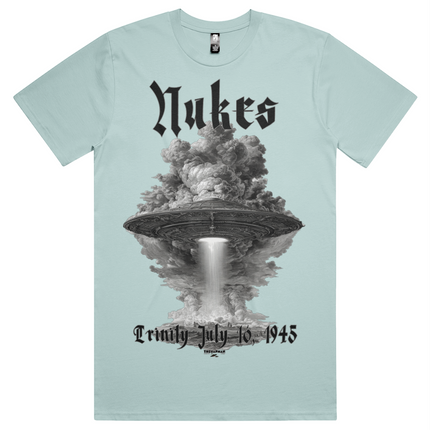 Light blue t-shirt with a graphic design of a mushroom cloud and 'Nukes' text on a white background