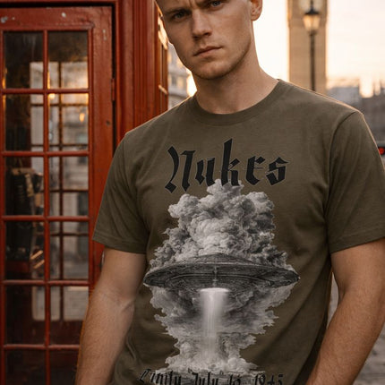 Man wearing a t-shirt with a graphic design in front of a telephone booth and Big Ben.